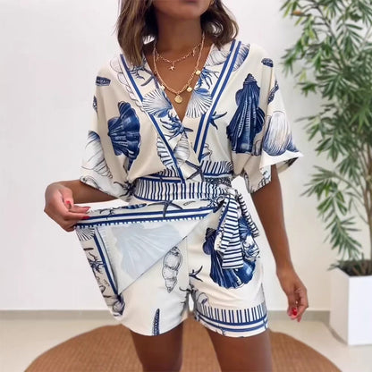 👗 50% RABATT! 🏝️ Schmeichelhafter V-Ausschnitt Playsuit im exotischen Tropenprint – Leicht, luftig & dein unverzichtbares Sommer-Urlaubsoutfit – perfekt für Strand, Pool und heiße Tage 🌸